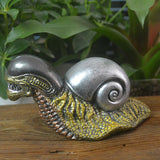 Evil mutant snail field ornament