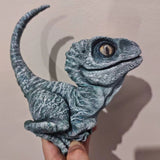 New born Velociraptor blue dinosaur ornament