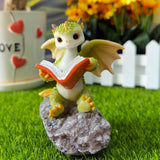 Read a book dinosaur resin ornament