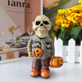 The skeleton man with the pumpkin resin ornaments