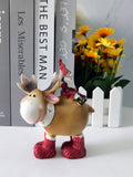 Santa Claus resin ornament with moose