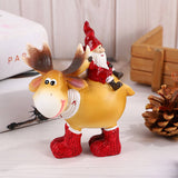 Santa Claus resin ornament with moose