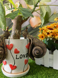 Garden snail resin ornament