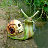 Halloween skeleton snail skull sculpture