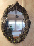 Goddess mirror with amulet