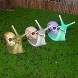 Halloween skeleton snail skull sculpture